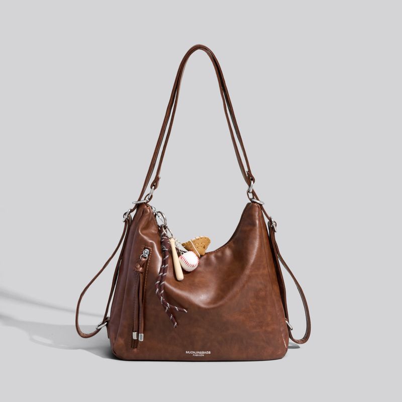 

Large Capacity Backpack Bag Women s 2025 New Shoulder Messenger Bag Light Luxury Niche High Sense Three-Purpose Tote Bag Brown delivery pendant