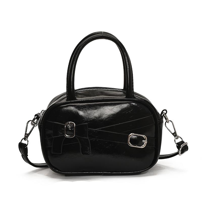 This year, Korean niche design sense, portable bowling bag, versatile high-end sense, foreign style fashion messenger women's bag