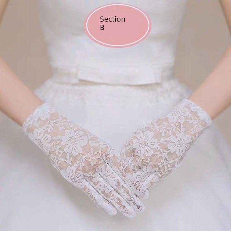 

Свадебные перчатки для невесты Новые свадебные кружевные ажурные короткие перчатки Женские тонкие белые свадебные перчатки Section B All yards