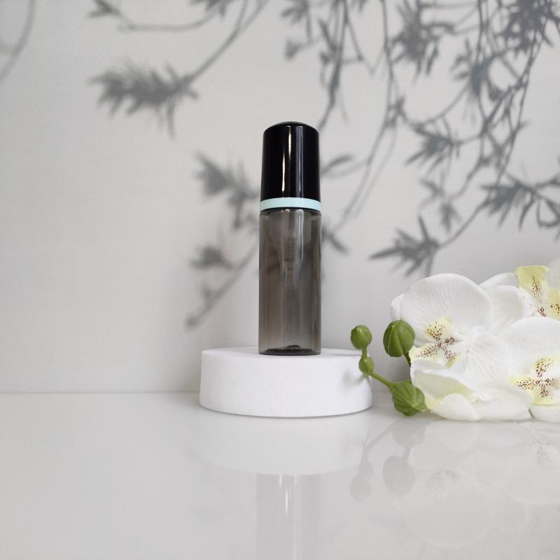 Available 60ml Transparent Black Foam Mousse Bottle for Face Wash and Travel-friendly Cosmetic Packaging.