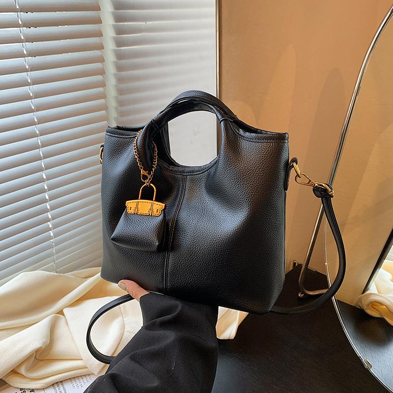 

Ретро модна жіноча сумочка нова великої місткості сумка-тоут з коров ячої шкіри з візерунком на плече повсякденна сумка через плече чорний