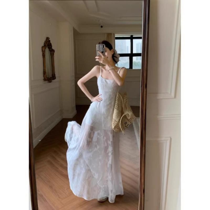 Summer new French fresh and sweet suspender dress women's seaside vacation wear waist medium and long skirt