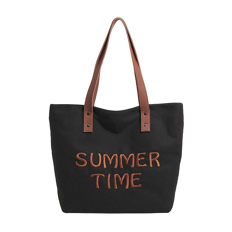 

Alphabet canvas bag women s 2025 summer new large-capacity commuter bag leisure shoulder college student class bag чёрный
