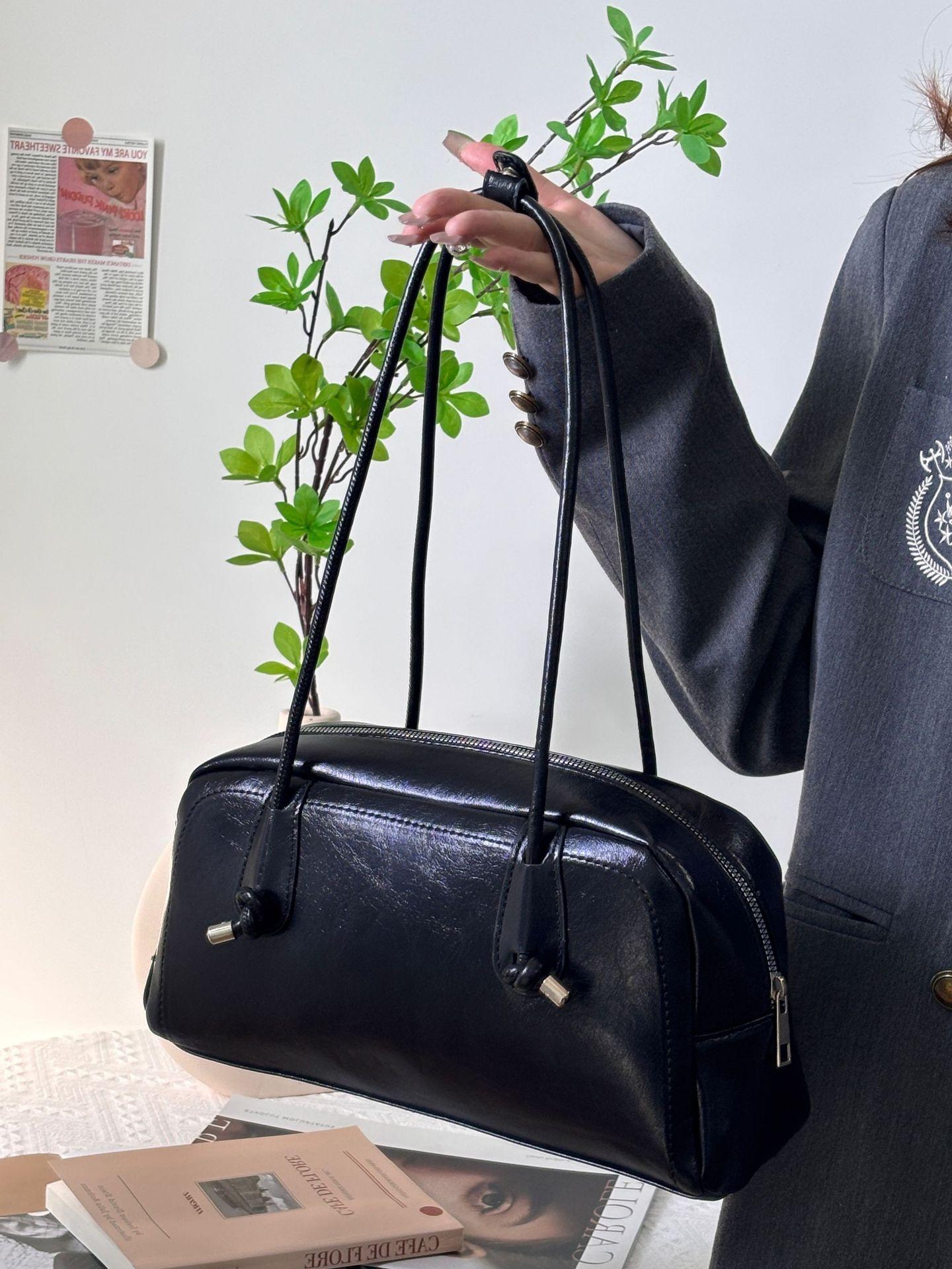 

Бостонская большая сумка женская большой вместимости 2025 новая высококлассная текстура нишевая для поездок на работу одноплечевая подмышечная сумка-подушка чёрный