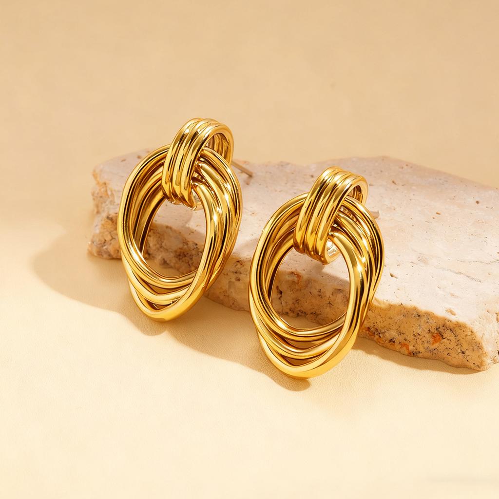 Metal winding oval hollow silver needle stud earrings environmentally friendly fashion niche earrings