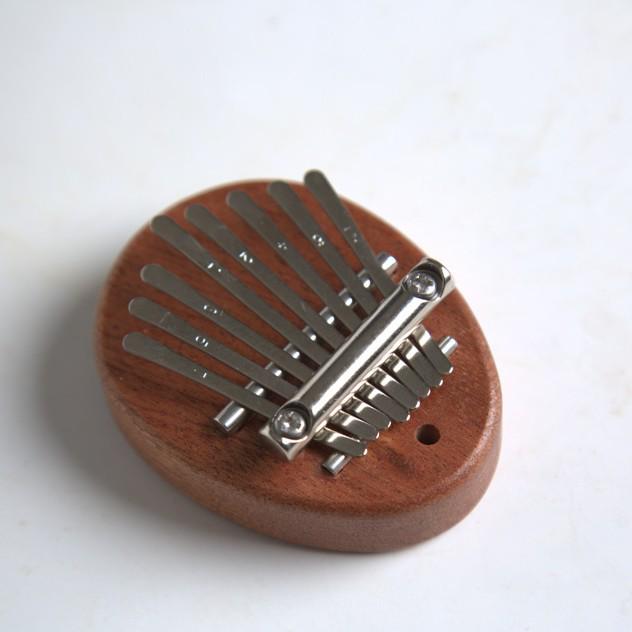 Daumenklavier-Anhänger: Mini 8-Noten Kalimba Fingerklavier