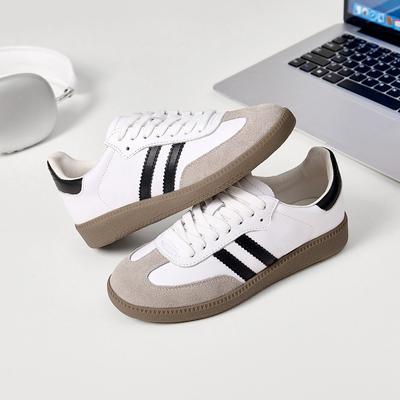 Trois œillets première couche cuir de vachette chaussures de sport décontractées semelle souple surface souple doublure en peau de mouton hommes et femmes