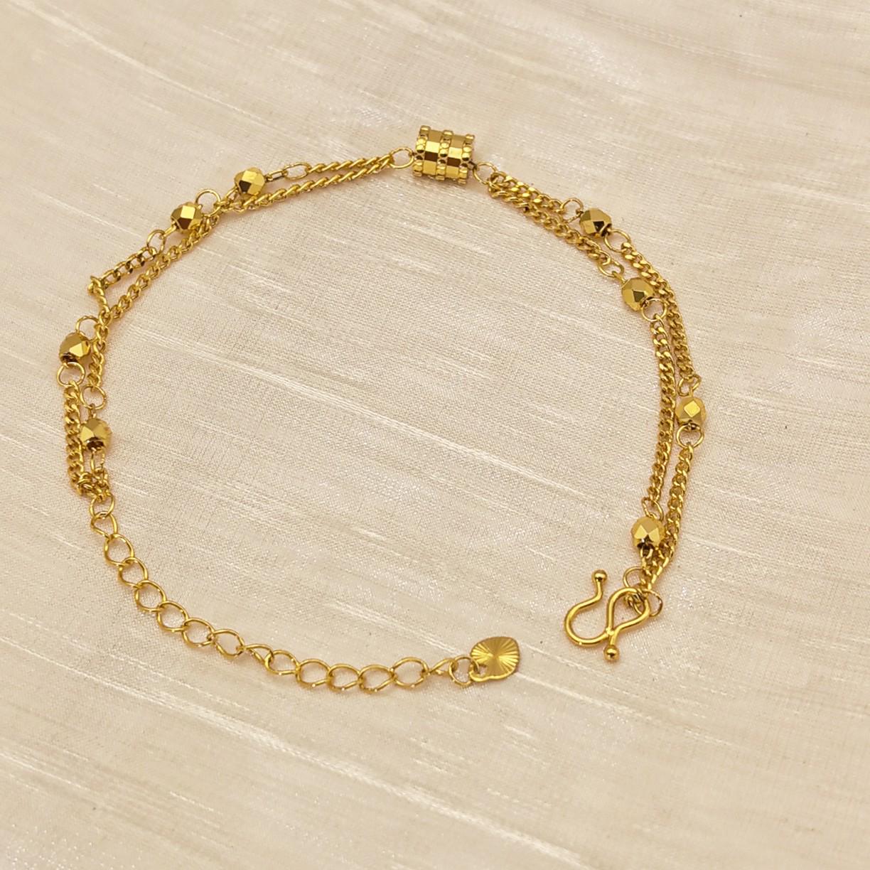 

Elegant Women s Double-Layer Bracelet: Brass Plated, Simulated Gold, Featuring Luck Beads, Versatile and Exquisite Design.