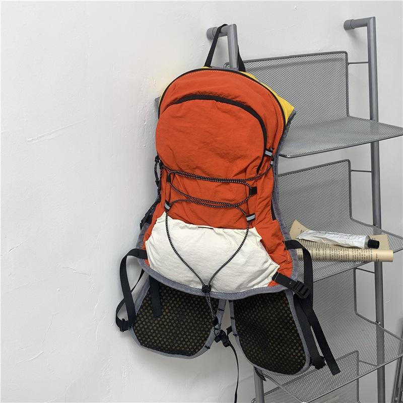 Schoolbag Functional Wind Backpack Men and Women 1011 New Lightweight Travel Backpack Lightweight Waterproof Mountaineering Bag Outdoor Socks Puppet