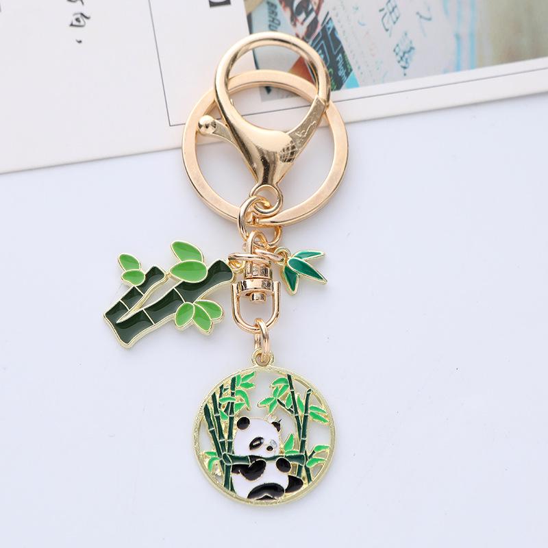 Quirky Cartoon Panda Alloy Keychain Pendant with Cute Bamboo Leaf Design - Earphone Case & Bag Decoration