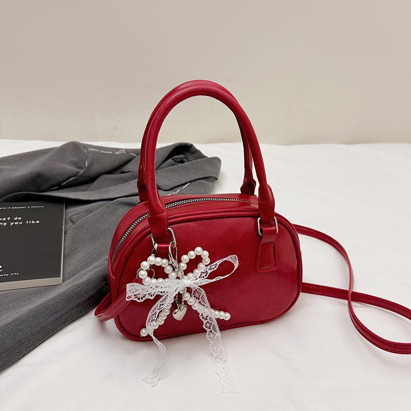 Neue Nischendesign modische Textur Handtasche Bowlingtasche Damen vielseitige Schulter Umhängetasche