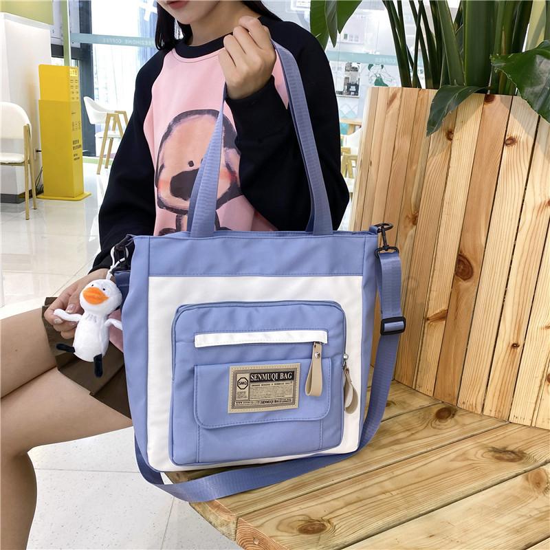 Canvas bag new large-capacity make-up bag dual-purpose tote bag women's schoolbag students junior high school high school canvas messenger bag