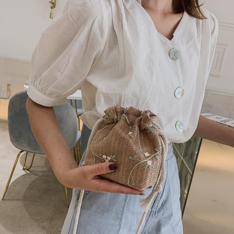 1pc Chic Women’s Drawstring Bucket Bag - Lightweight Polyester Crossbody with Floral Embroidery, Adjustable Strap & Decorative Flower Design