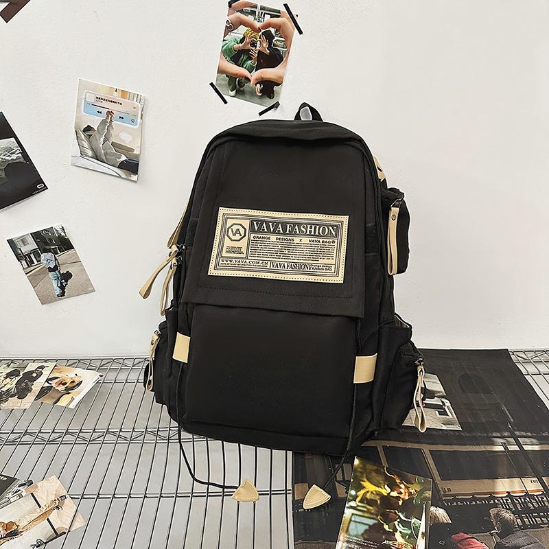 New large-capacity schoolbag men's trendy cool couple casual backpack Korean version ins junior high school student computer backpack