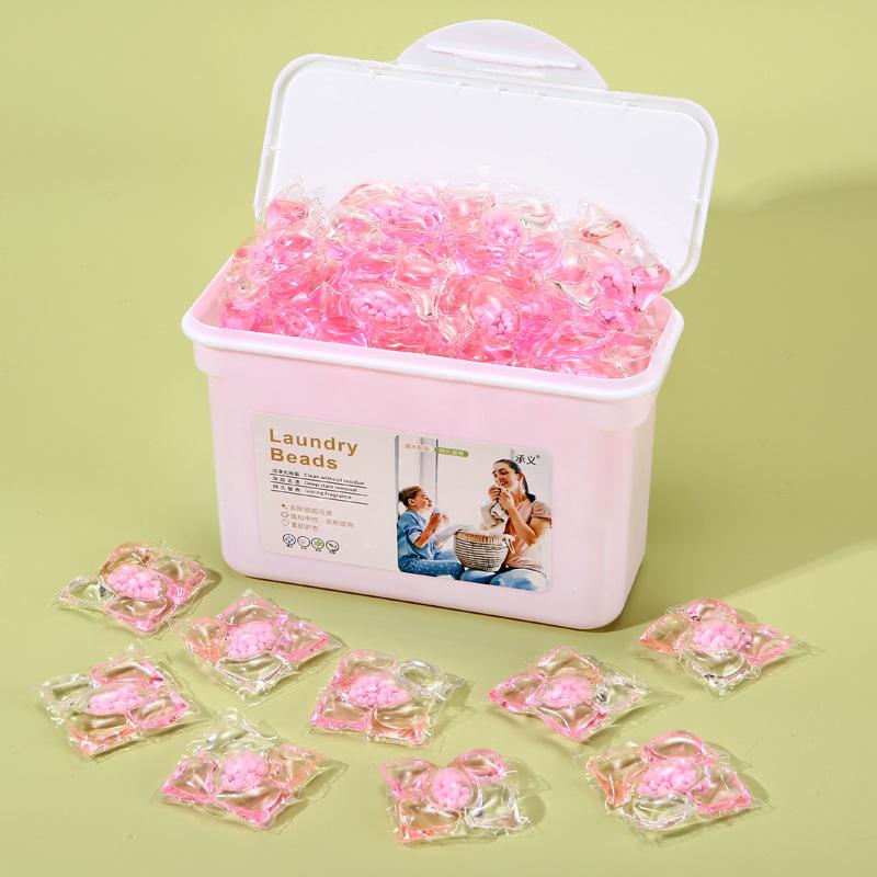 Fünf-in-Eins Waschmittel-Pods: Lang anhaltender Duft, Fleckenentfernung, Weichspülen und konzentrierte Waschmittelperlen.