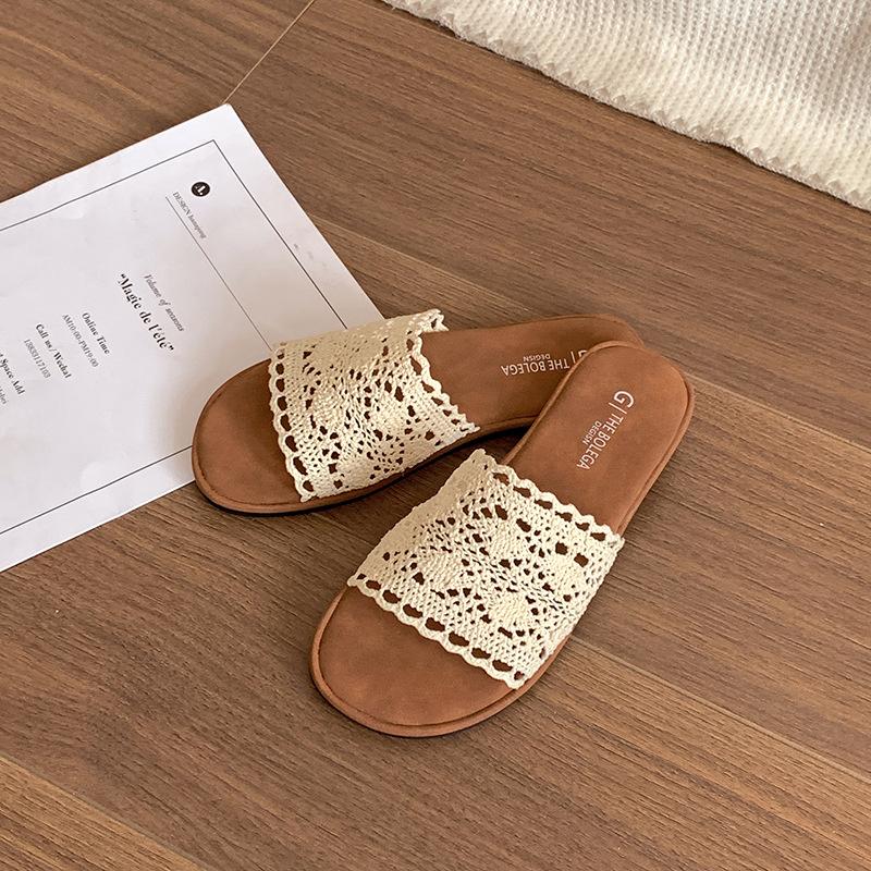 

Retro woven flat-bottomed one-word slippers for women to wear 2025 new fairy style with skirt vacation beach slippers 35