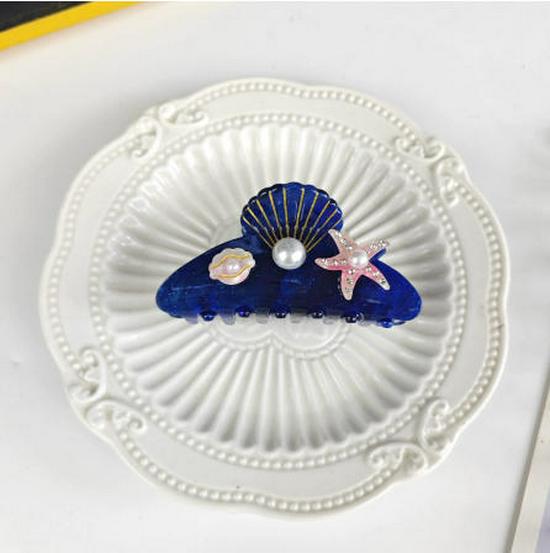 Elegancka spinka do włosów z cyrkoniami w kształcie rozgwiazdy i muszelkowa klamra do upięć