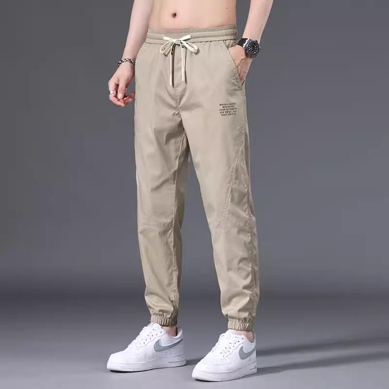 Casual pants men's loose feet tied spring new college students versatile trend