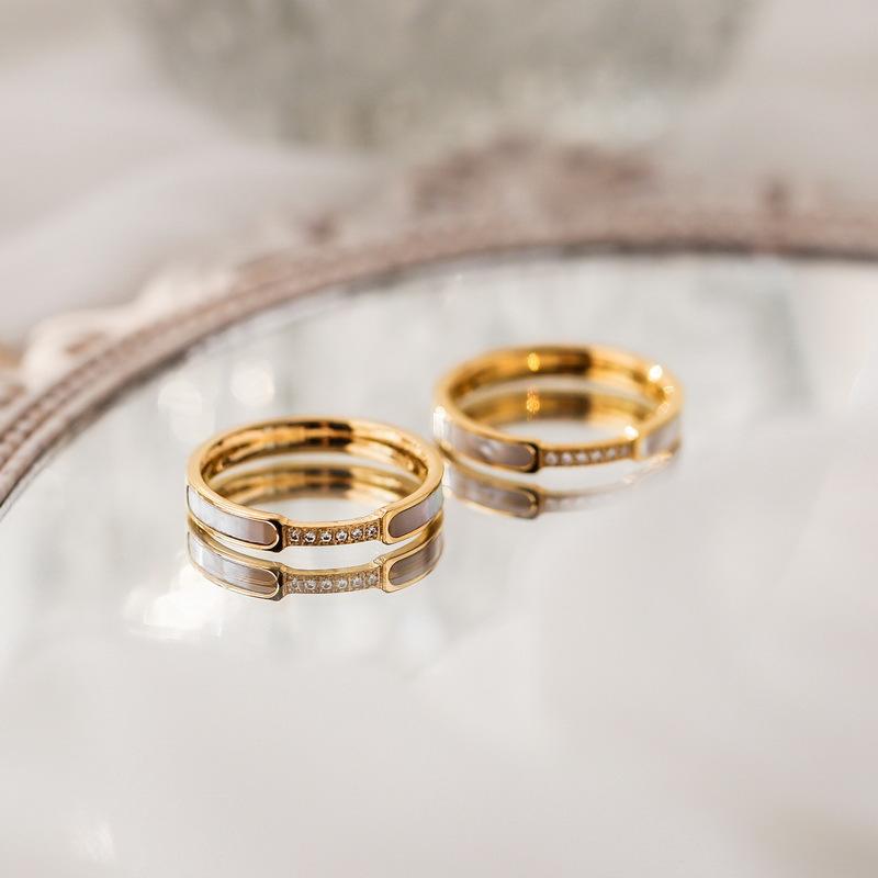 Light luxury versatile inlaid shell ring titanium steel ring women's niche design finger rings