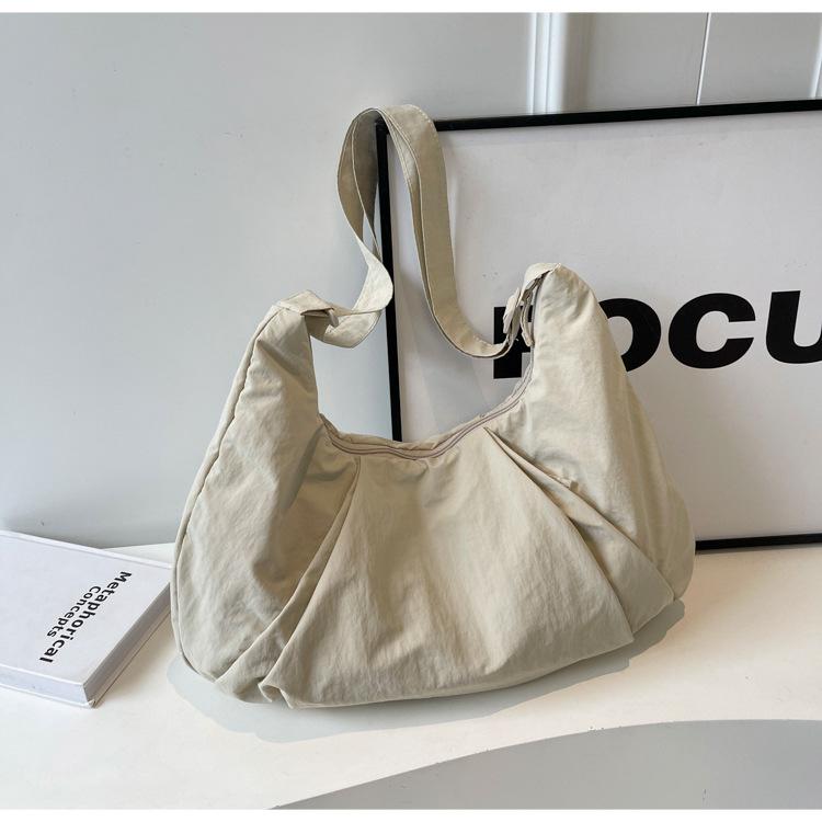 Japanese Pleated Large-capacity Solid-color Messenger Bag Female Commuter Nylon Cloth Dumpling Bag Student Class Leisure Shoulder Bag