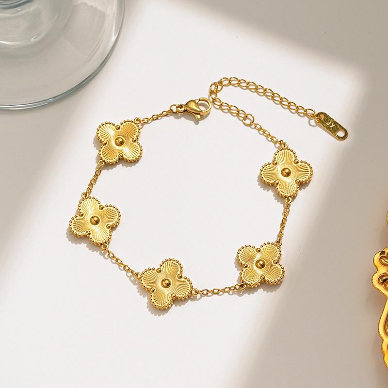 Elegant Four-Leaf Clover Necklace & Bracelet Set - Titanium Steel, Laser-Cut Design, Stylish for European & American Fashion.