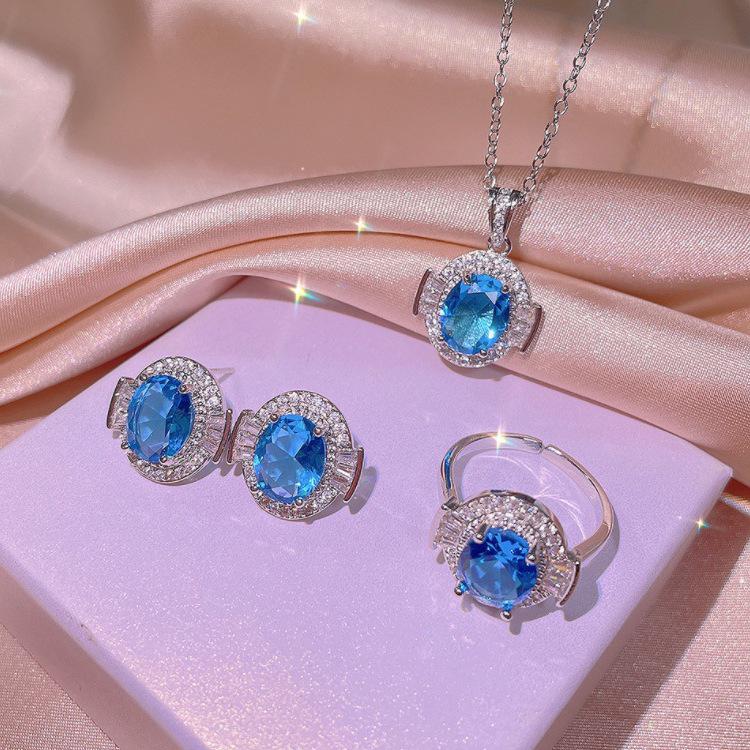 High-End Imitation Topaz Moissanite Blue Pendant with Water Wave Chain - Unisex Alloy Design