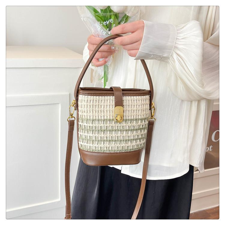 Summer Hand-held Straw Bag Niche Fashion High-end Women's Shoulder Messenger Bag Summer New Woven Bag