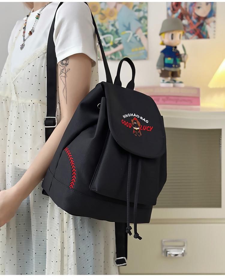 Japanese Student Casual Backpack with Embroidered Puppy Design, Drawstring Closure, and Matching Small Bag for Daily Use.