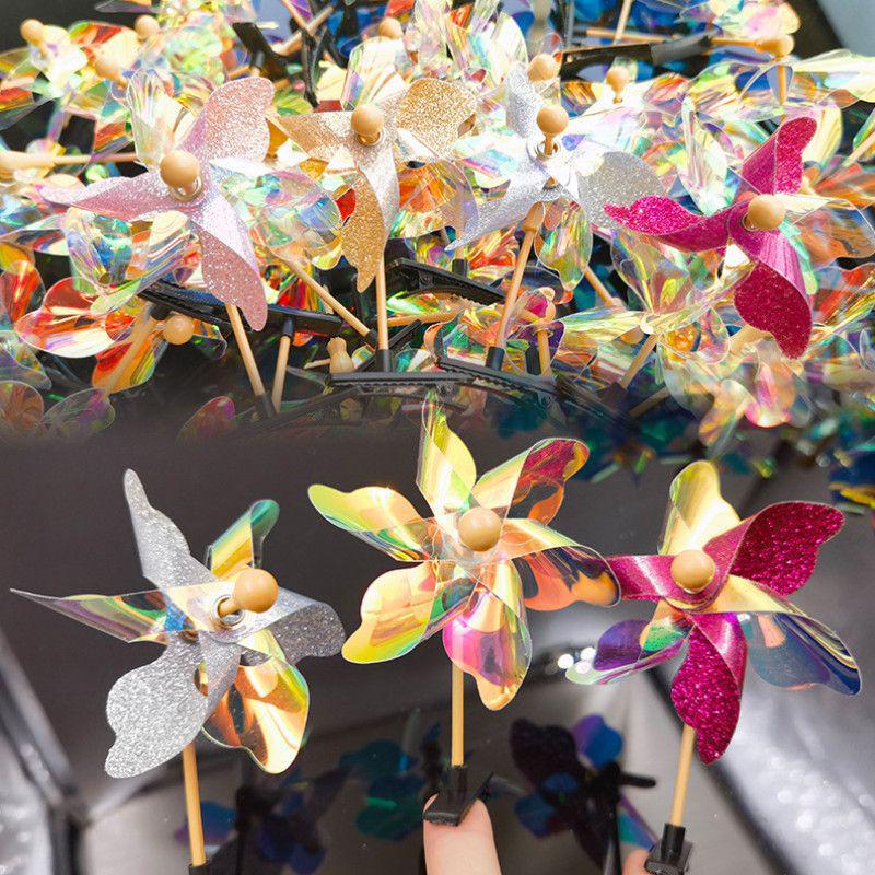 

Colorful Laser Pinwheel Hair Clip - Perfect for Kids Events and Gifts Laser pinwheel hair clip 11 pcs