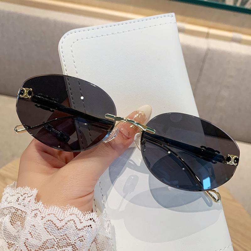Oval Frame Metal Frameless Uv400 Sunglasses Trendy And High-End Retro Fashion Sun Protection Uv Resistant Glasses For Women