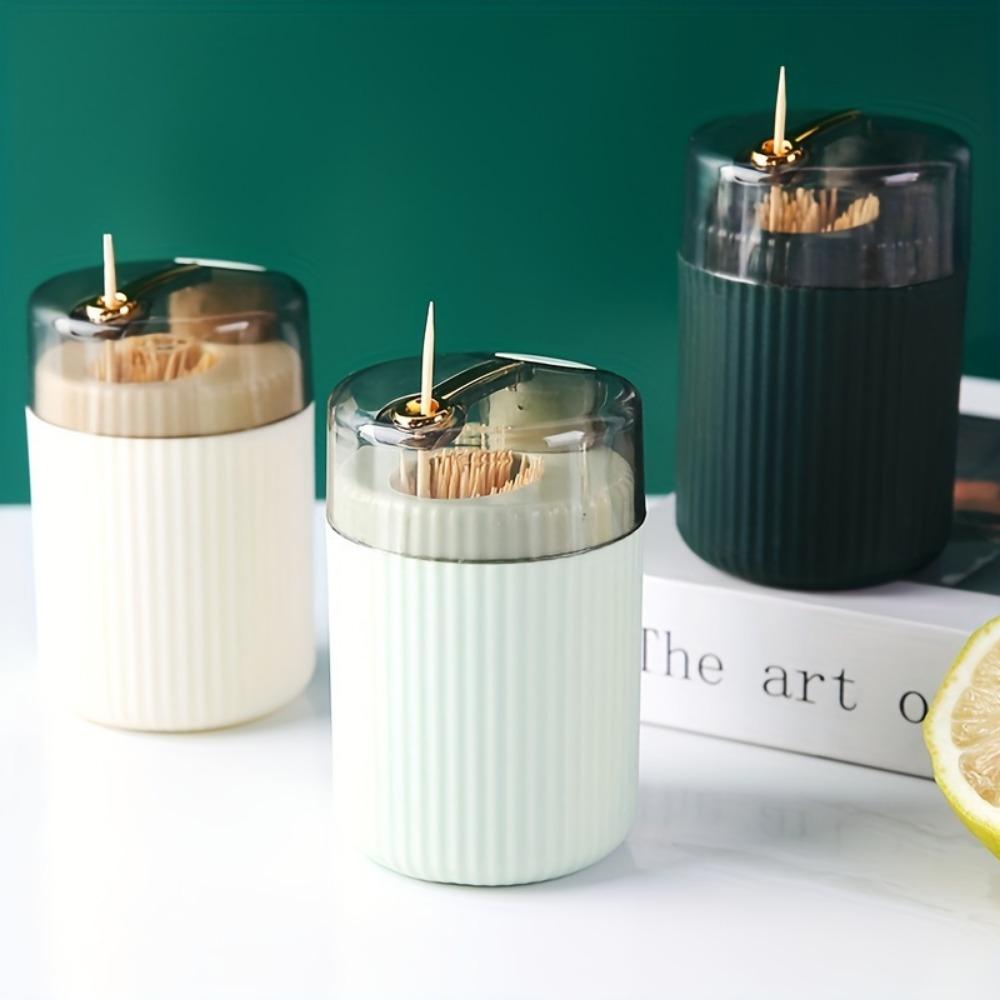 1ks automatický dávkovač držáku párátek s lisovací a vyklápěcí horní částí, plastový materiál pro snadný a hygienický přístup k párátkům