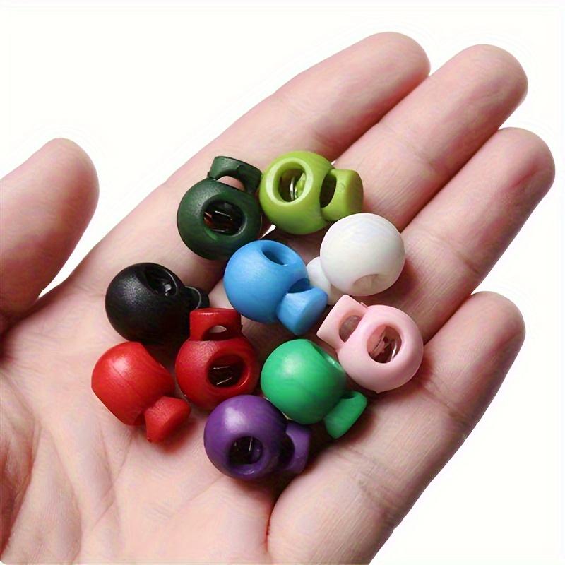 

Ґудзик Пластиковий затягуючий Кольоровий пружинний ґудзик Нитка Мотузка Ґудзик Свинячий ніс 10pcs різнокольоровий