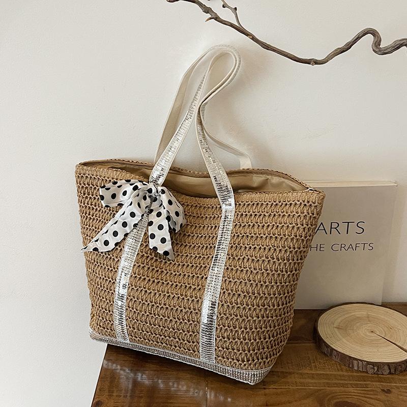 

Large capacity straw bag women s new summer seaside beach bag niche woven shoulder tote bag срібний