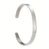 Elegant Adjustable Polished Bangle: Women's C-Shaped Bracelet with Engraved Pattern and Text Logo in Stainless Steel