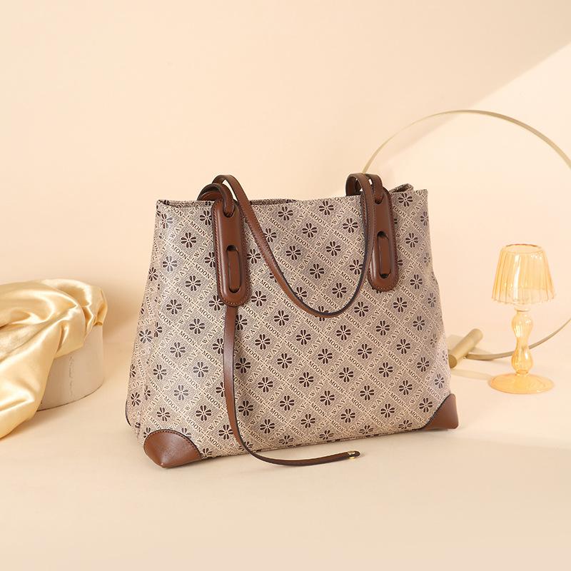 

New women s bags, fashionable shoulder bags, large-capacity tote bags, printed high-end atmospheric commuting handbags