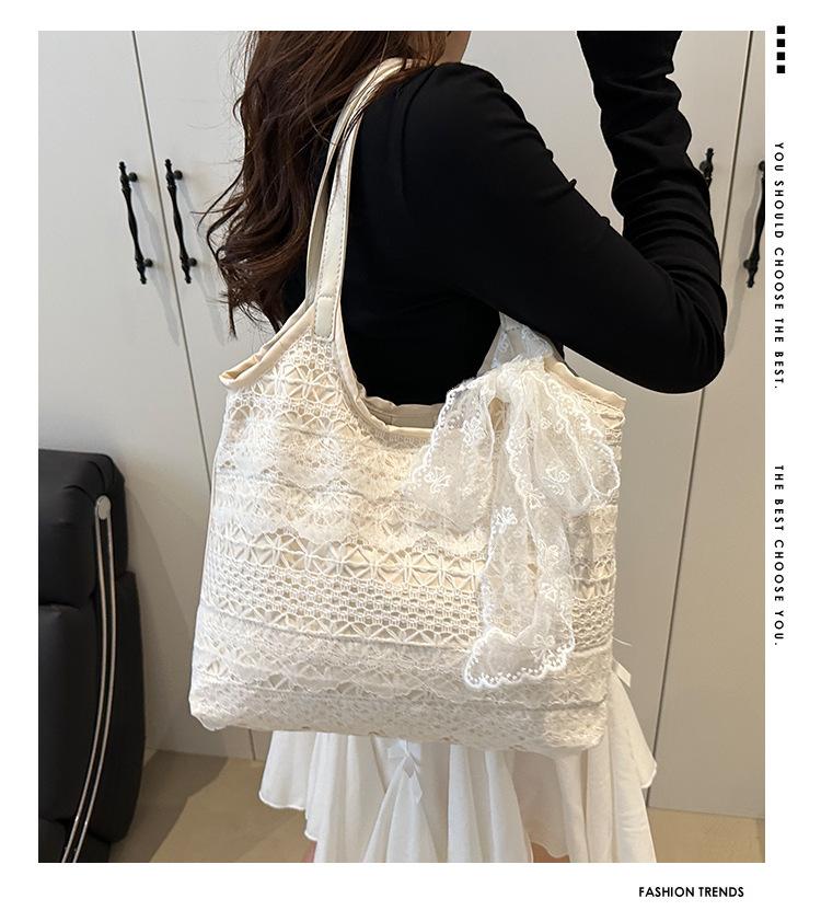 Super hot new seaside weaving large-capacity tote bag women's summer casual lace mesh single shoulder armpit bag