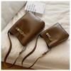 2023 Fashionable Simple Commuter Light Luxury Bag Buckle Shoulder Crossbody Bag Black Coffee Color City Simple Pu Bucket Bag