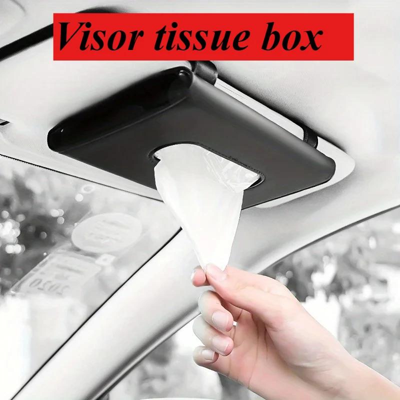 Creative tissue box for car interior, a back-hanging paper towel bag located at the rear seat headrest.