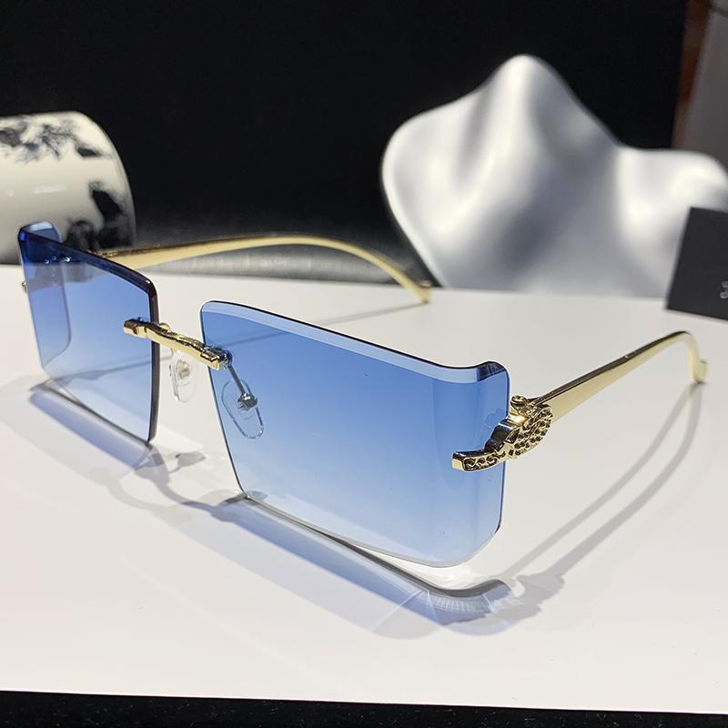 

New Curved Lens Leopard Head Metal Frameless Edge Cutting High-quality Sunglasses 90300 синий