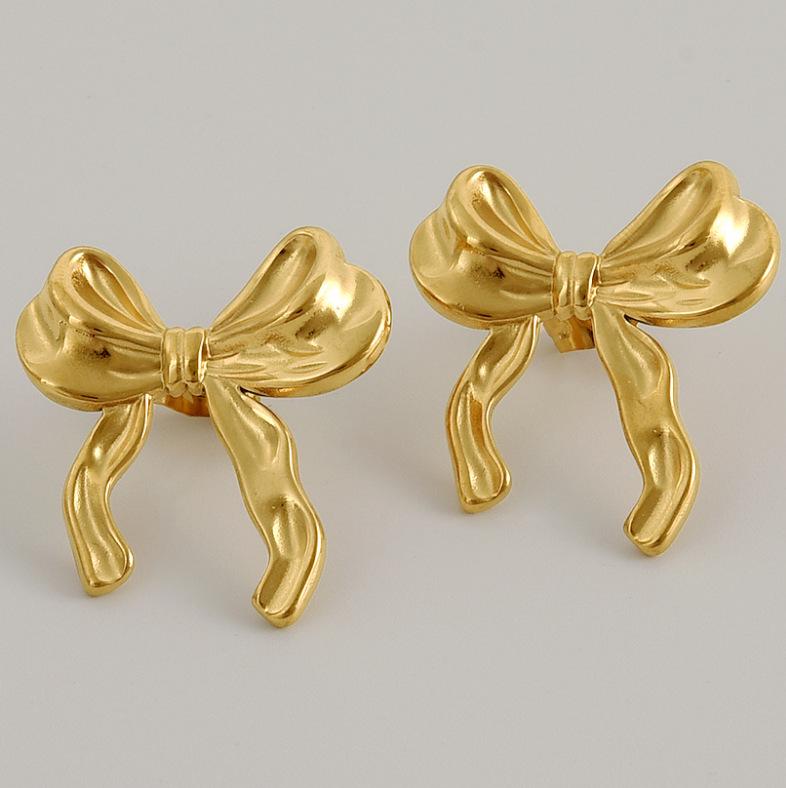Eco-friendly Alloy Gold Bow Hollow Stud Earrings - High-end Fashion Hot Seller