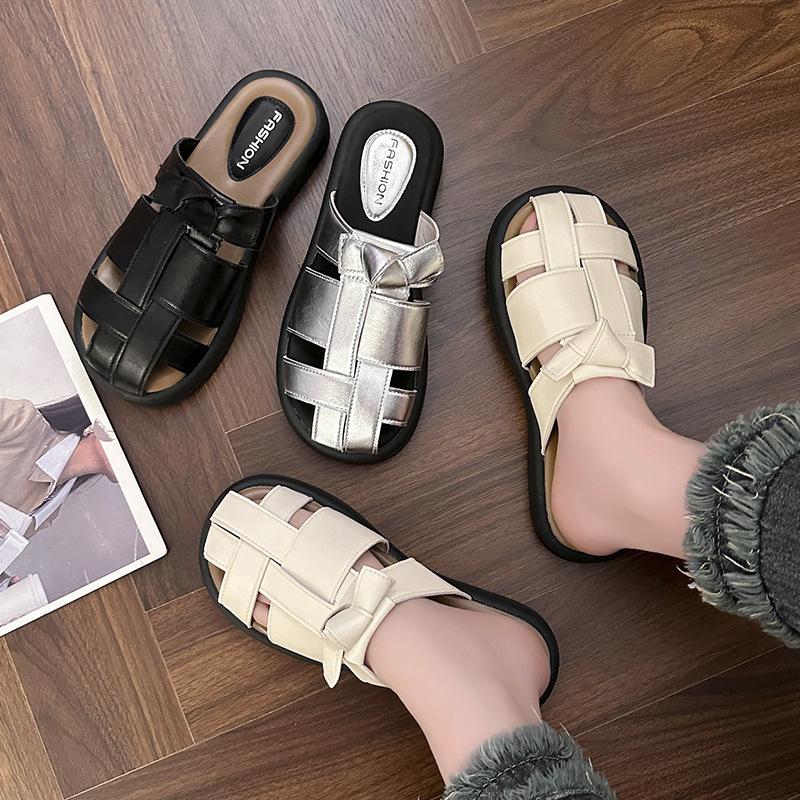 2025 summer new bag head half slippers female retro woven cool slippers female retro fairy wind soft flat Roman shoes