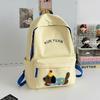 Schoolbag new cute puppy backpack large capacity primary school students junior high school students lightweight schoolbag simple fashion alphabet 