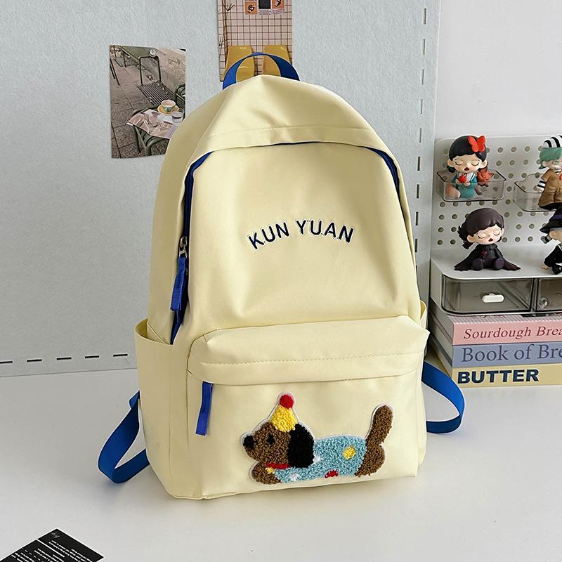 Schoolbag new cute puppy backpack large capacity primary school students junior high school students lightweight schoolbag simple fashion alphabet 