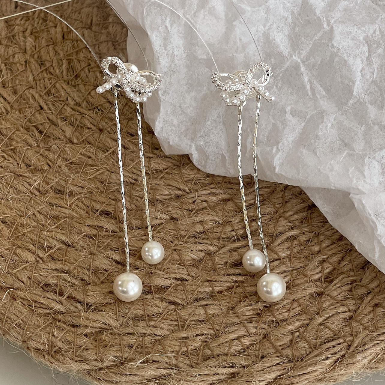 Elegant Pearl Bow Tassel Earrings: Versatile, Face-Slimming, Light Luxury Design