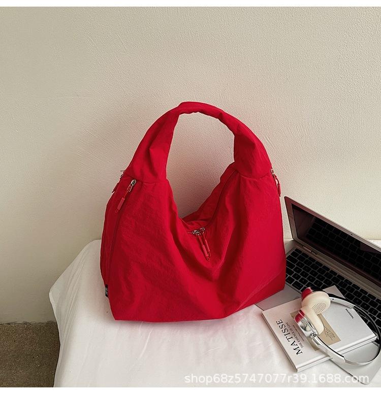 2025 New Large Capacity Versatile Portable Canvas Bag Premium Sense Tote Bag Fashion Commuter Underarm Shoulder Bag Women