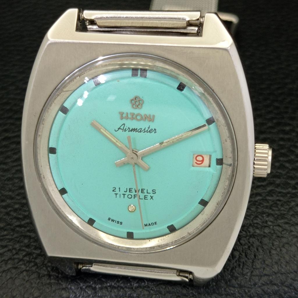 USED TITONI AIRMASTER TITOFLEX SWISS MENS TURQUOISE BLUE DIAL WATCH a432179-2 R110-a432179