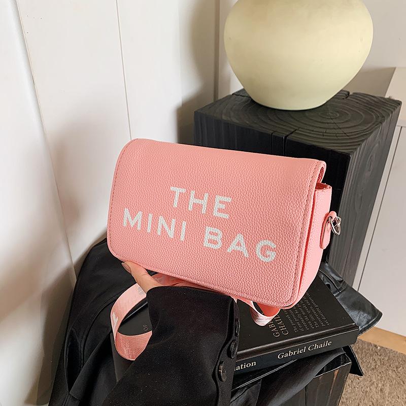 

Simple small square bag women s bag autumn new letter printed shoulder bag commuter versatile messenger bag розовый