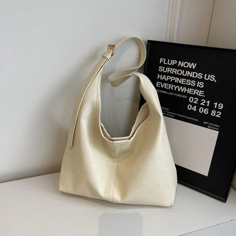 Retro Autumn New Large Capacity 2025 New Korean Version Fashion Solid Color Casual Commuting Shoulder Tote Bag Women