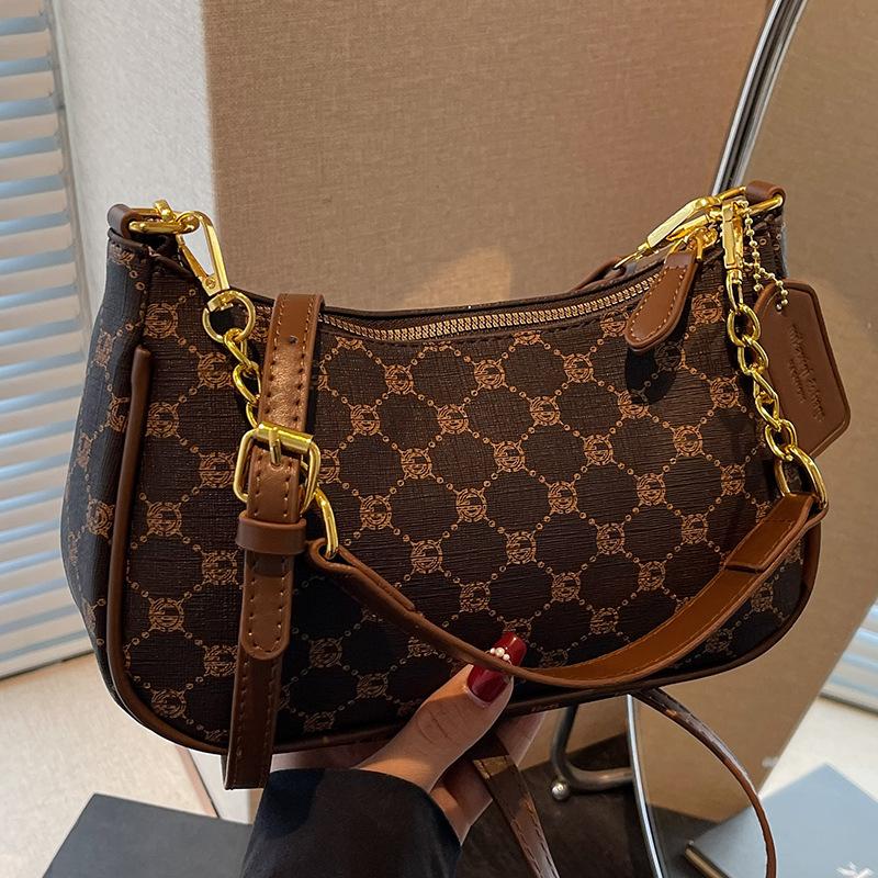 Beliebte einzelne Schulter Achseltasche Sommer neu einfach bedruckt Retro Baguette Tasche lässige Halbmondtasche Tide