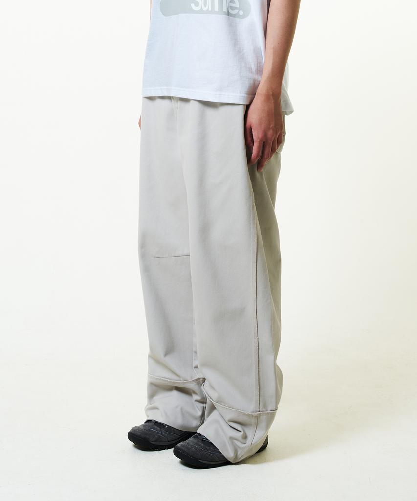 THE COLDEST MOMENT Tcm Cut Out Offset Pocket Pants (Beige)